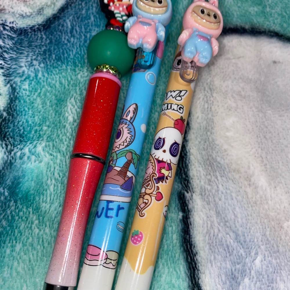 Red and Blue Character-Themed Toy Pens